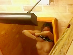 Constricted body babe tries on skimpy raiment