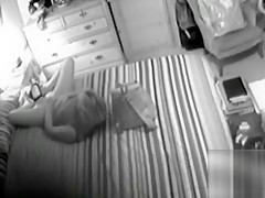 Bored housewife masturbates to big O in the bedroom