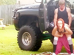 Non-Professional redhead in 4x4 acquires fuck in public