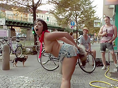 Breasty Euro honey arse plugged in public
