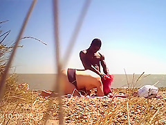 Watcing Plump PAWG engulfing large darksome 10-Pounder on in nature's garb beach