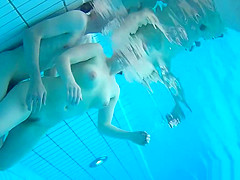 Underwater scenes of the nude chicks in the sauna pool