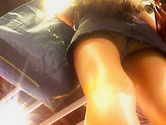 Upskirt of a darksome jeans petticoat