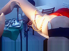 cutie in red on a gynecological chair