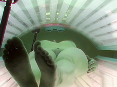 Brunette Hair Hot Gal Relaxing in Solarium