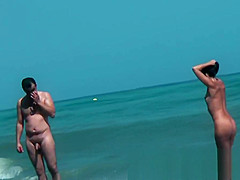 Hawt beach nudist beauties acquire their sexy butts admired