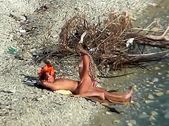 Pair fucking on a public beach, whilst walking past people