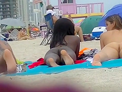 EXHIBITIONIST WIFE #98- HEATHER TAKES HER HUBBY HER GIRLFRIEND TO THE UNDRESSED BEACH! VOYEUR POV