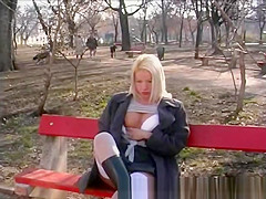 golden-haired gal pissing in public