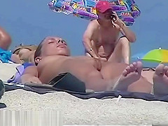 In Nature's Garb beach spy camera with a hawt pair in focus