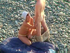 Voyeur on public beach Fellatio sex