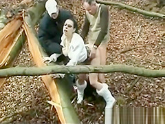 Lascivious Floozy screwed by two Mature Males in Forest